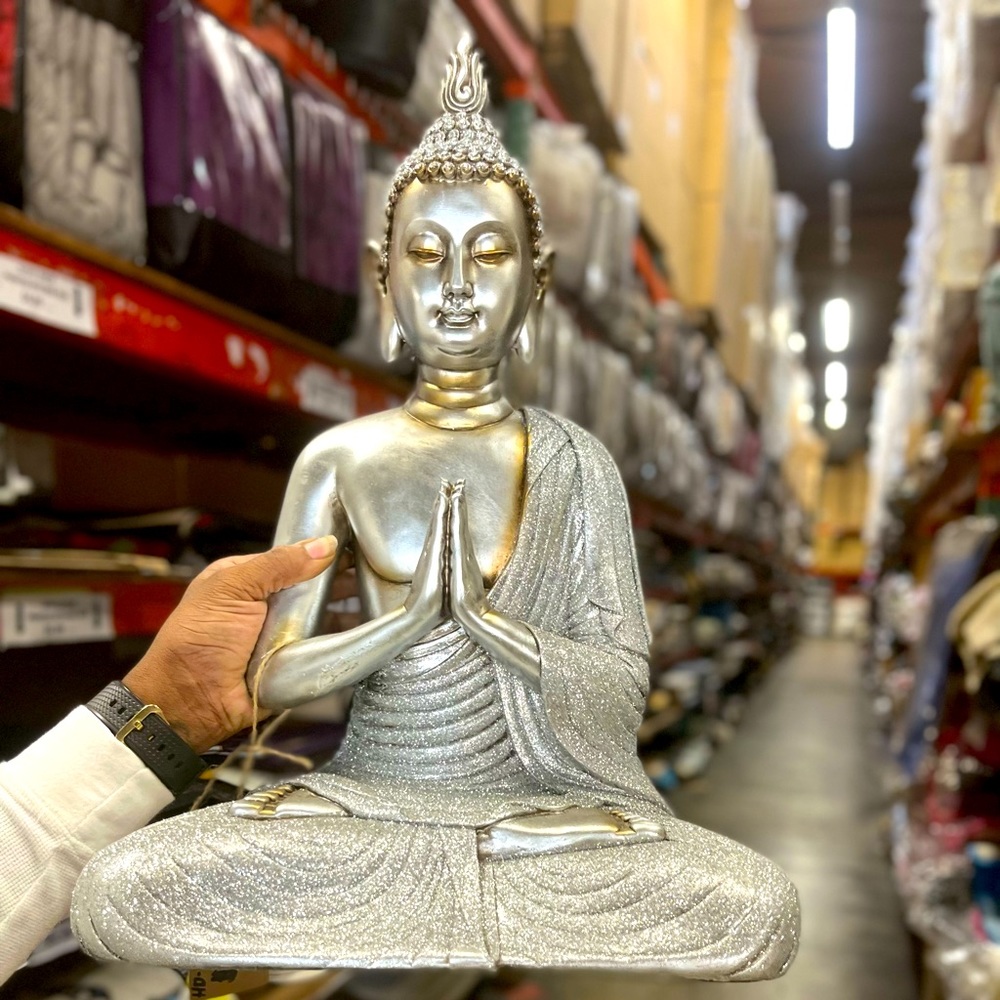 Silver Buddha blessings statue